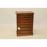 19th century mahogany collectors' cabinet with eight graduated drawers, secured by a pin,