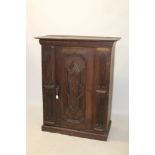 Unusual carved oak enclosed cupboard with projecting cornice and relief frieze carved - CTRIENE