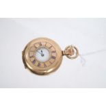 Ladies' gold (9ct) half hunter fob watch with stem-wind movement,