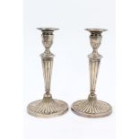 Pair contemporary silver 'batwing' candlesticks with fluted columns,