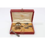 Cartier silver four piece christening set - comprising knife, fork, spoon and pusher,