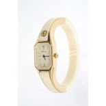 Ladies' Hermes bangle wristwatch in gilt and white ivorine case,