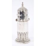 Victorian silver sugar caster of lighthouse form, with fluted decoration,