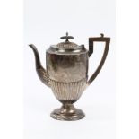 Edwardian silver coffee pot of half-fluted form, with long spout,