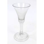 Georgian wine glass with trumpet-shaped bowl, air-bubble in base on plain stem,