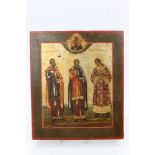 19th century Russian Icon with three saints below deity reserve in borders,