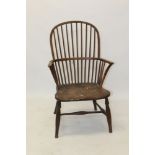 Victorian ash and elm Windsor elbow chair with arched rack back and solid seat on turned legs and