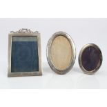 Victorian silver photograph frame of rectangular form, with ribbon crest (London 1896),