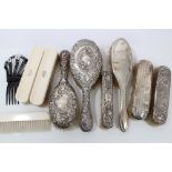 Quantity of Edwardian and later silver mounted dressing table brushes (various dates and makers),