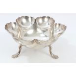 Large late Victorian silver dish of lobed form, with decorative border and hand-beaten finish,