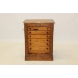 Victorian walnut collectors' cabinet, having eight graduated drawers,