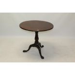 George II mahogany occasional table - circular solid top on birdcage-action and bulbous vase-shaped