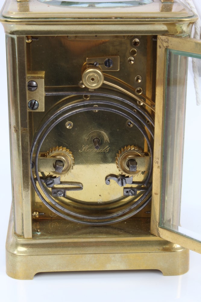 Late 19th century French repeating carriage clock in brass case with white enamelled dial and - Image 3 of 5