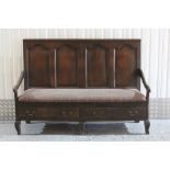 Rare early George III dated oak settle,