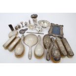Late Victorian silver mounted dressing table set with rococo scroll and foliate decoration -