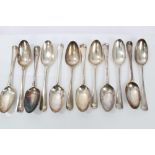 Twelve Georgian silver Hanoverian pattern tablespoons with engraved crests (various dates and