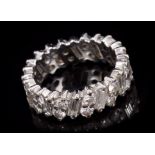 Diamond full band eternity ring with baguette cut diamonds alternating with duos of brilliant cut