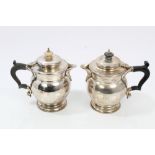 George V two piece silver café au lait set of squat baluster form, with sparrow beak spouts,