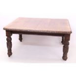 Victorian carved oak extending dining table,