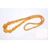 Amber bead necklace with a string of oval butterscotch amber graduated beads,