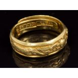 19th century Chinese high carat gold ring, cast with a dragon and the pearl of Wisdom,