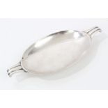 1940s silver dish of oval form, with scroll handles, in the Art Deco style,