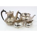 Edwardian four piece tea and coffee set - comprising teapot of oval form, with fluted decoration,