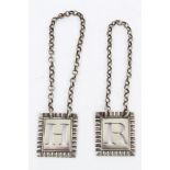 Pair George III silver decanter labels of square form, with gadrooned borders and suspension chains,