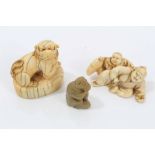 19th century Japanese carved ivory netsuke - carved as four jovial figures reclining on carpets,