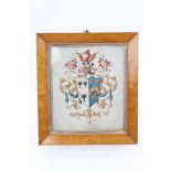 19th century painted coat of arms in glazed birds-eye maple frame