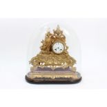 Ornate late 19th century French gilt metal mantel clock with white enamel dial, cylinder movement,