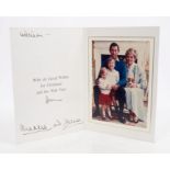 TRH The Prince and Princess of Wales - signed Christmas card with twin gilt embossed Royal ciphers