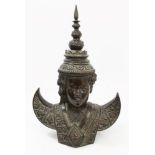 19th century Thai bronze bust, the young figure in traditional costume with finialled hat,