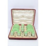 1920s Shelley bone china coffee set - comprising six pale-green cups and saucers with gold rims and