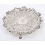 George IV silver waiter of hexagonal form, with engraved floral decoration and armorial crest,