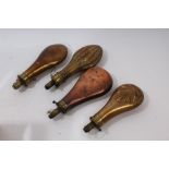 Group of four 19th century copper and brass powder flasks - to include two plain flasks - one by G.