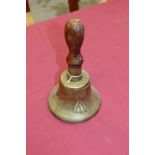 First World War British Military brass bell with cast broad arrow marks and turned wooden handle