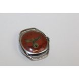 Second World War period chromium plate wristwatch with red dial depicting Nazi eagle to centre