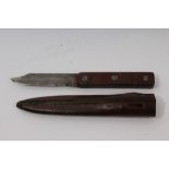 Second World War S.O.E. fighting knife with leather scabbard and fibre handle, marked - B.W.S.I.