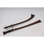 19th century Burmese kachin dha with broad hatchet tip blade and brass and leather covered grip,