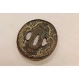 19th century Japanese bronze and silver tsuba with hoho bird and cloud decoration, signed, 8cm x 7.