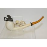 Unusual mid-19th century Austrian carved meerschaum pipe of elongated form,