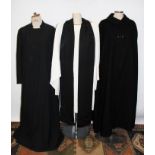 Gentlemen's good quality long black wool coat with lion-head fastening, by A. E. Almond Ltd.