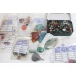 Collection of loose precious and semi-precious gemstones