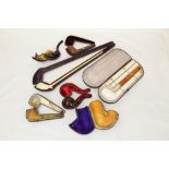 Large late 19th century four-section meerschaum pipe in case and six other cased pipes (7)