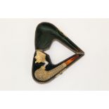Unusual early 20th century carved meerschaum pipe with projecting bowl carved as a grinning mask,