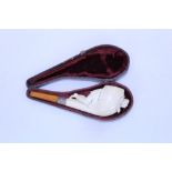Unusual novelty carved meerschaum pipe modelled as a young lady emerging through a porthole,
