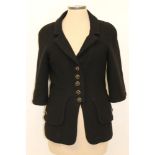 Chanel black bouclé jacket with logo gilt and fabric buttons, three-quarter length sleeves,
