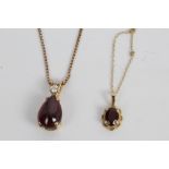 Gold mounted cabochon garnet and diamond pendant on rose gold (9ct) chain and one other garnet