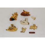 Group of small novelty carved meerschaum cheroot holders - including dog in a basket, 5cm wide,